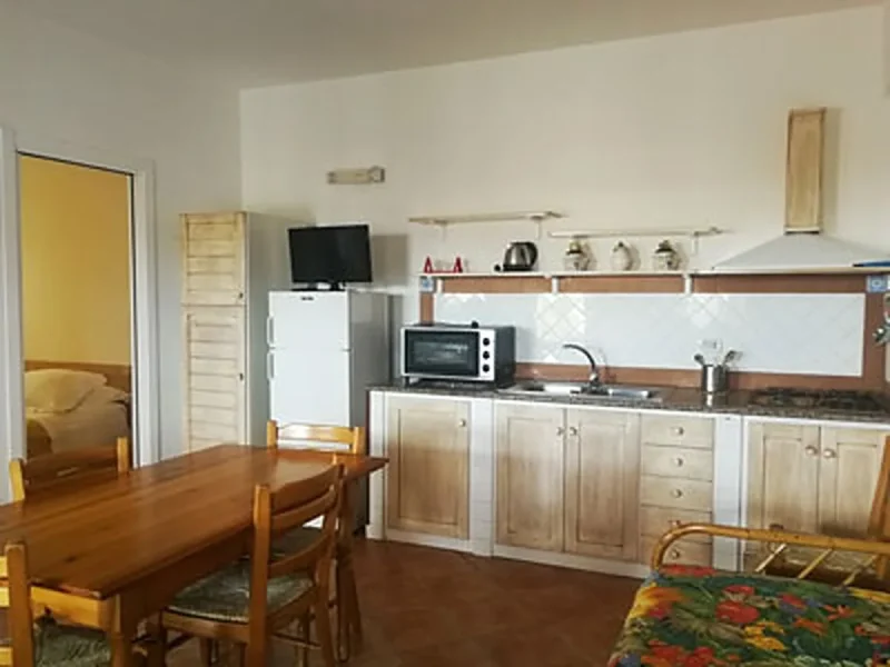 Soggiorno con angolo cottura